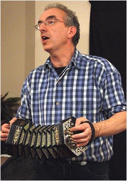 Photo of Brian Peters playing concertina
